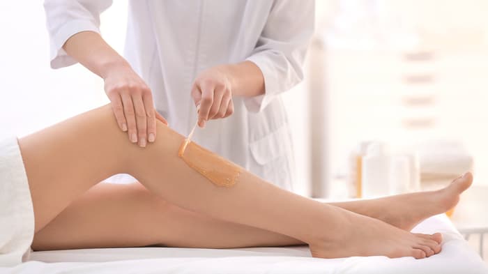 Woman receiving facial